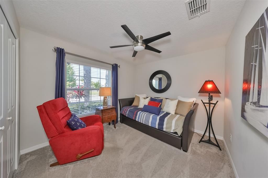 Third bedroom is also good size with a large window for sunshine and a custom fan.