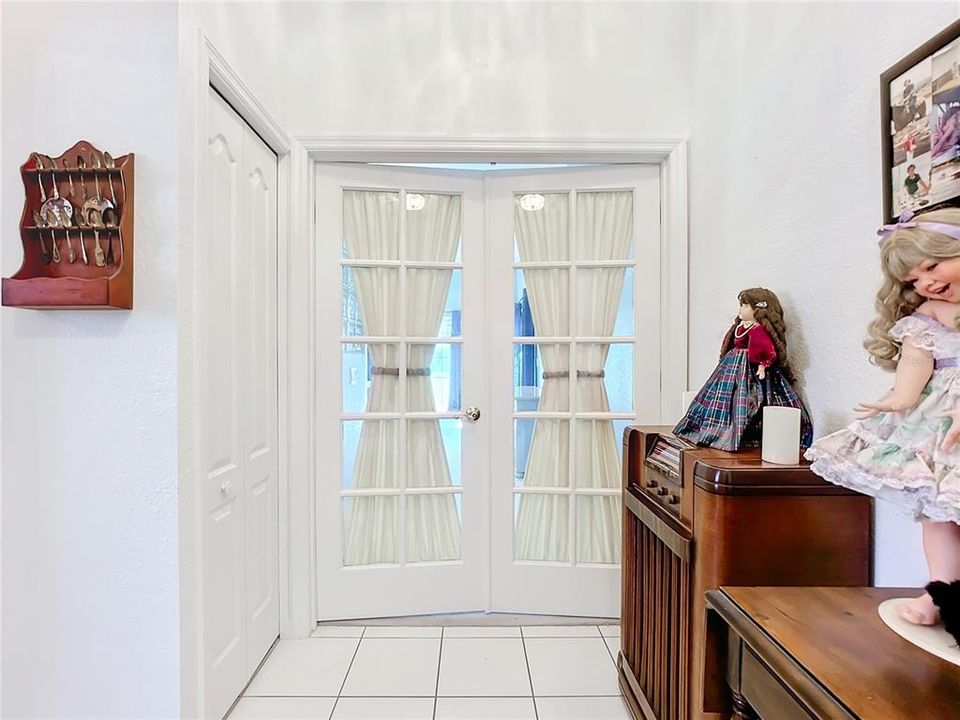 French doors leading to Primary Bedroom.