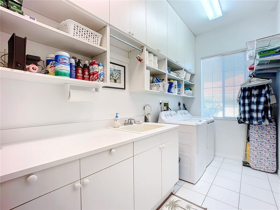 Spacious Laundry area & extra closet storage.