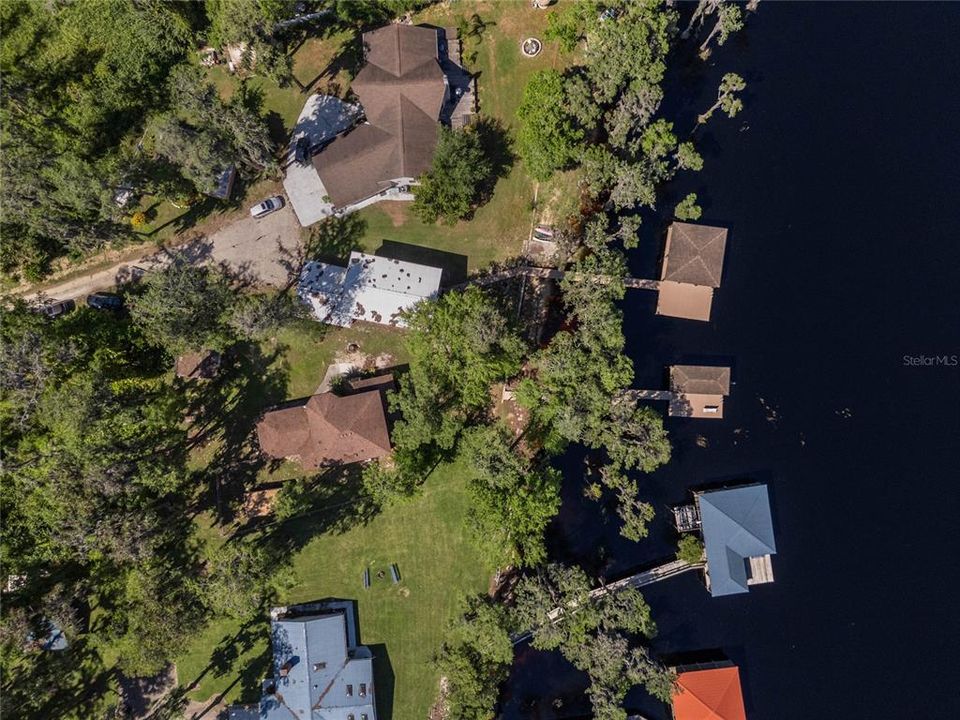 Aerial view of the two houses in the middle and docks