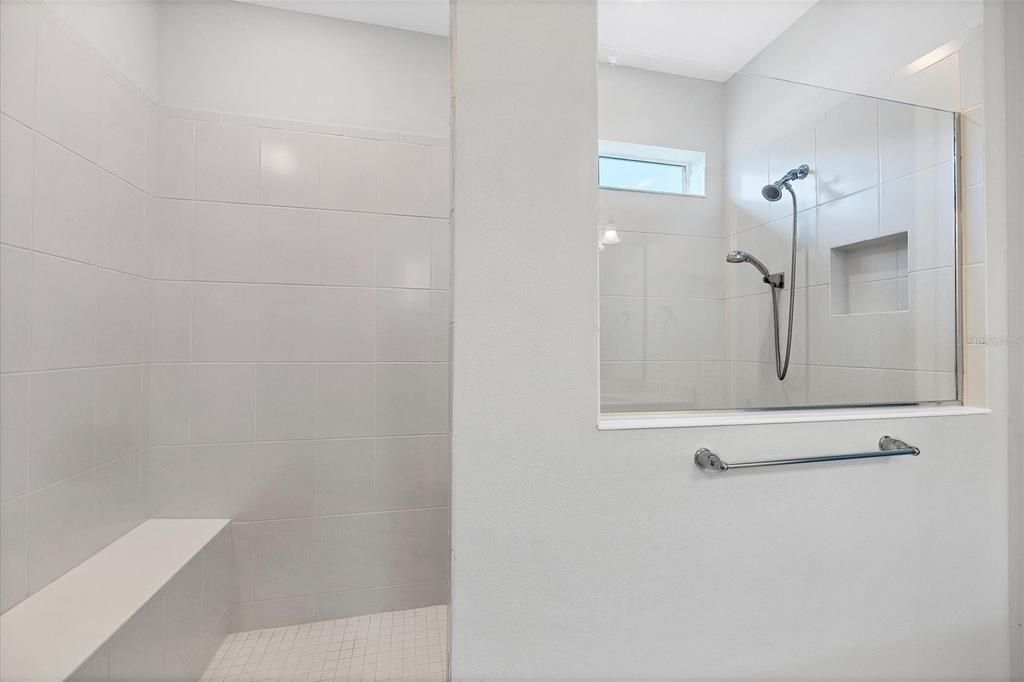 You'll love this over-sized super shower with bench and built in niche
