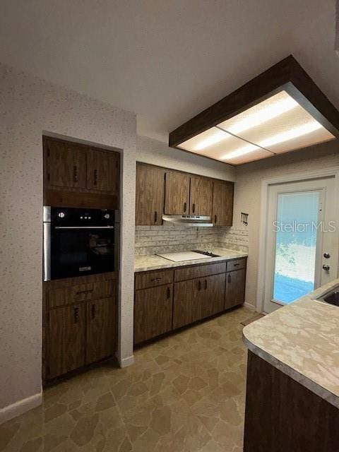 Kitchen with Access to Backyard
