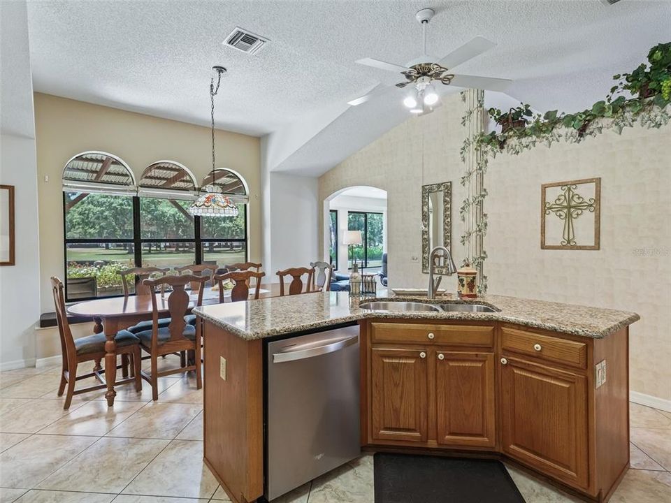 Open Kitchen with center Island overlooking the Dining area