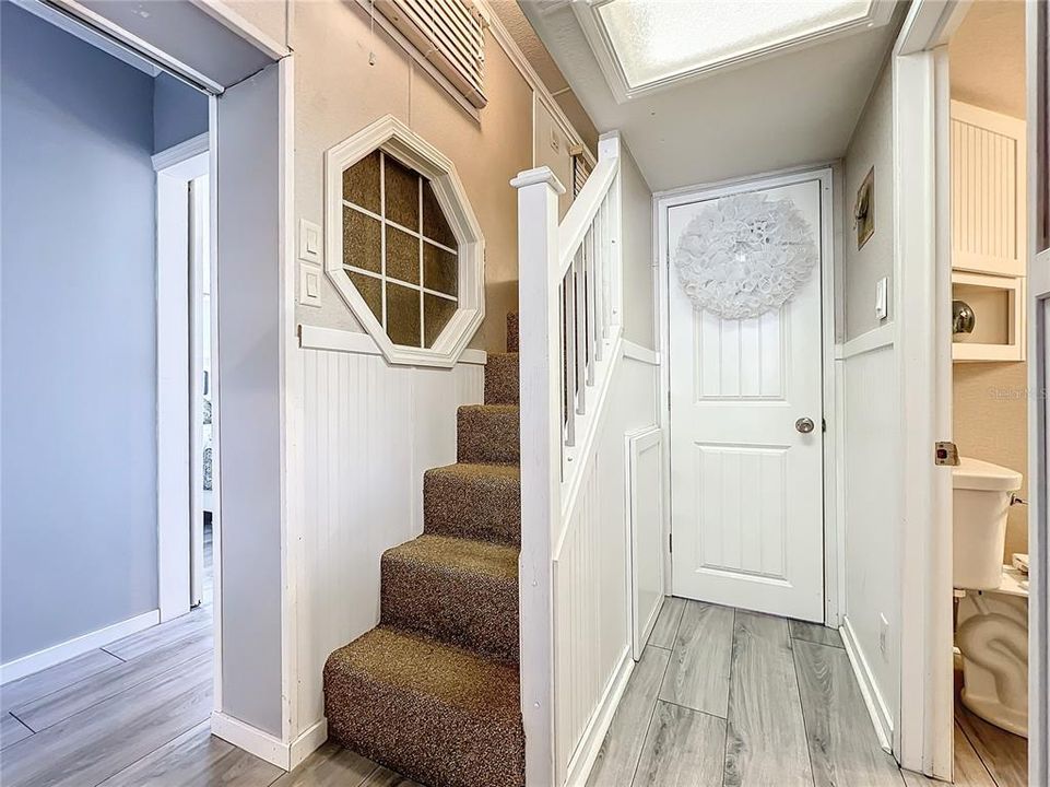 Stairs leading to Lofts and Door to Second Bedroom