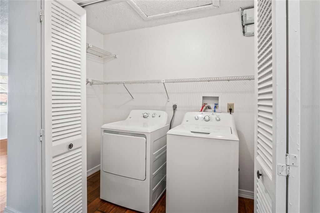 Washer and dryer is included in the purchase. Attic assess is above and plenty of storage.