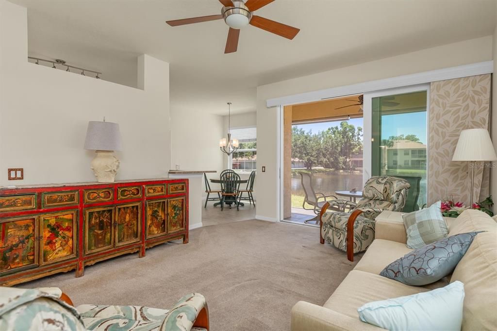 Large living area flows to the screened in Lanai and dine in Kitchen space 602 Casa Del Lago, Venice, FL, 34292