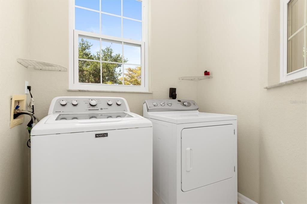 In unit laundry with it's own large storage room! 602 Casa Del Lago, Venice, FL, 34292