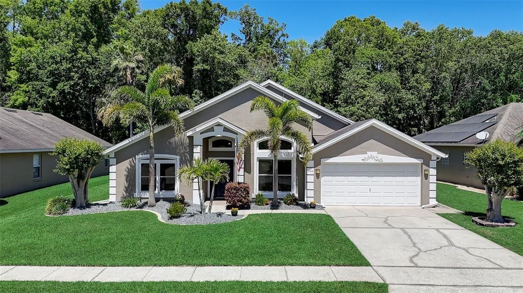 The FIRST THING YOU NOTICE when you arrive at the house is the PROFESSIONAL LANDSCAPING and CURB APPEAL of a HOME that is LOVED and TAKEN CARE OF!