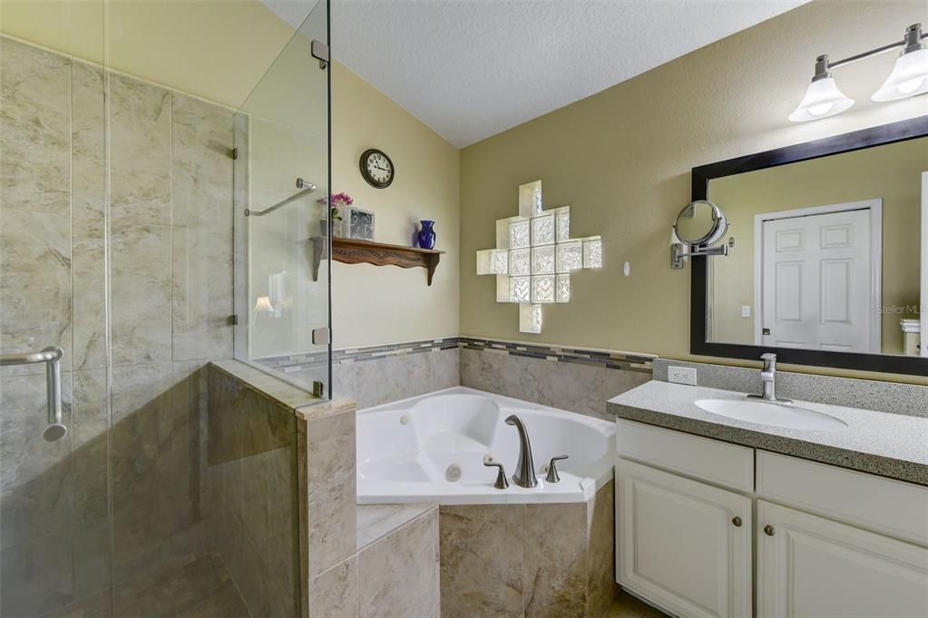 PRIMARY BATH - DOUBLE VANITY, GARDEN TUB AND ELEGANT STAND UP SHOWER WITH GLASS DOOR
