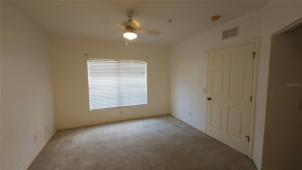 Primary bedroom has walk in closet and private bathroom