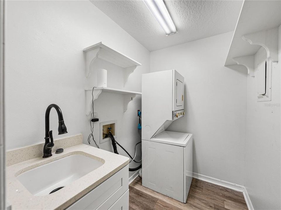 Laundry room with stack washer & dryer