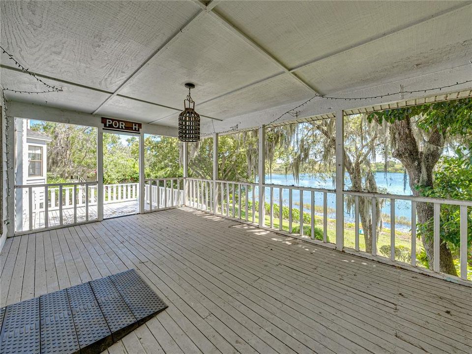 Screen porch off family room overlooking lake