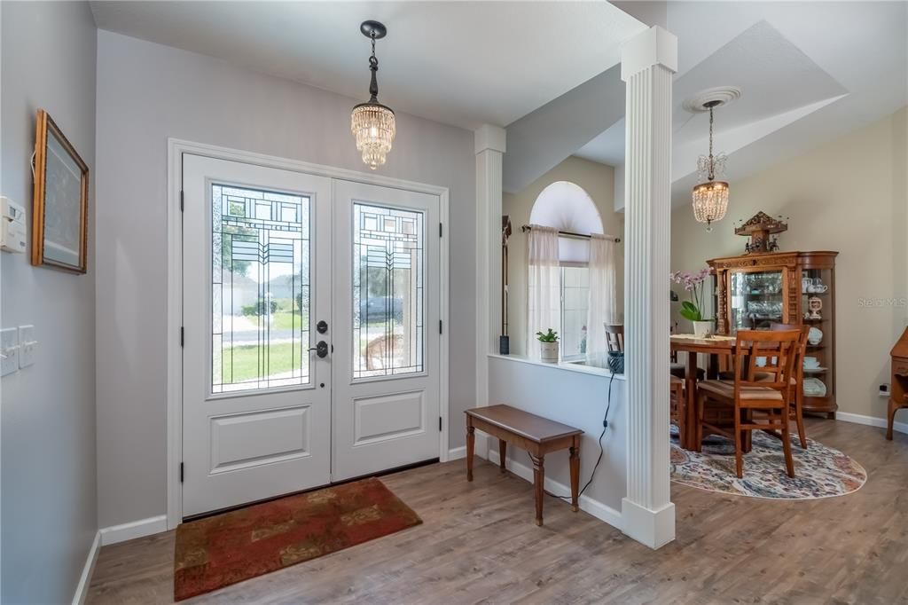 bright front hall, double glass doors