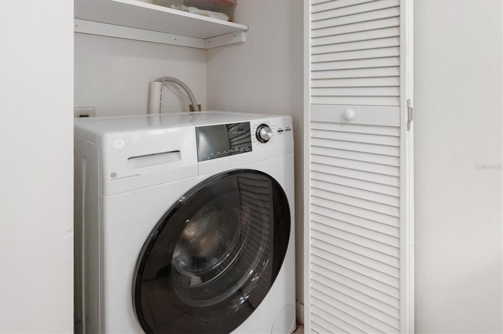 Interior Laundry with GE All-in-One Steam Washer & Dryer - Owner loves this!