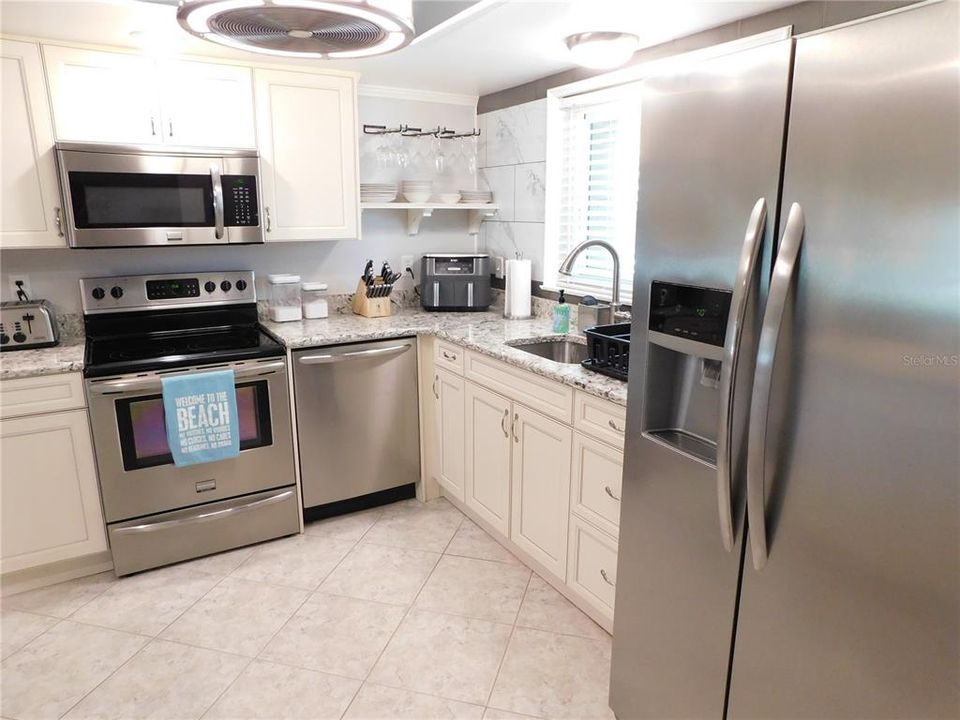 Kitchen With Stainless Steel Applicances