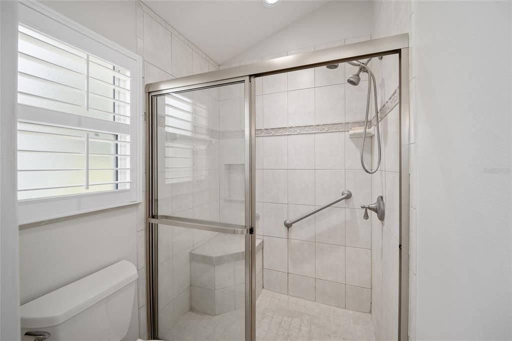 Private Privy, Tiled Shower and Window to Side Yard