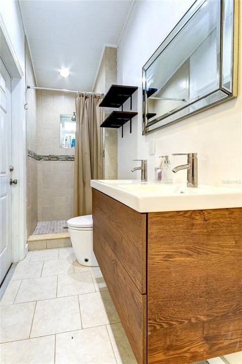 Master bathroom with shower and high tech toilet