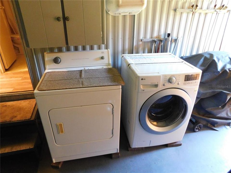 Laundry area is located in storage just off main home.