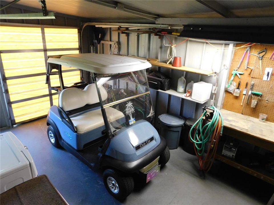 Golf cart storage and workshop.