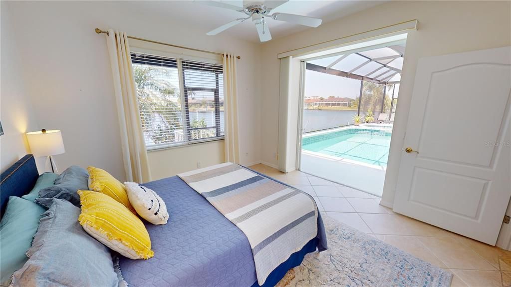 Rear guest suite with access to lanai and amazing water views