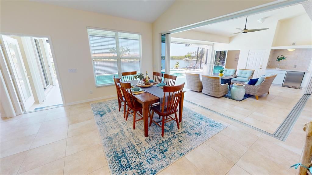 Dining room with view of lanai and waterfront