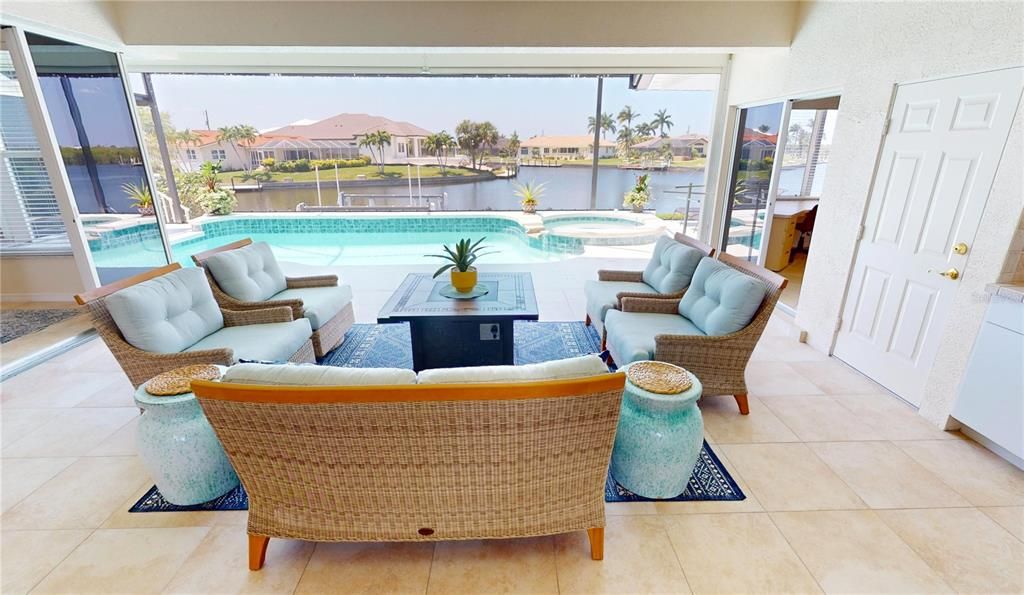 Extensive lanai with panoramic view of waterfront