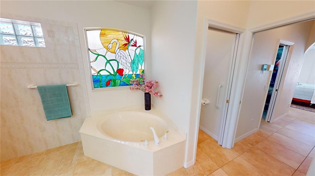Primary bath with garden tub and walk-in shower