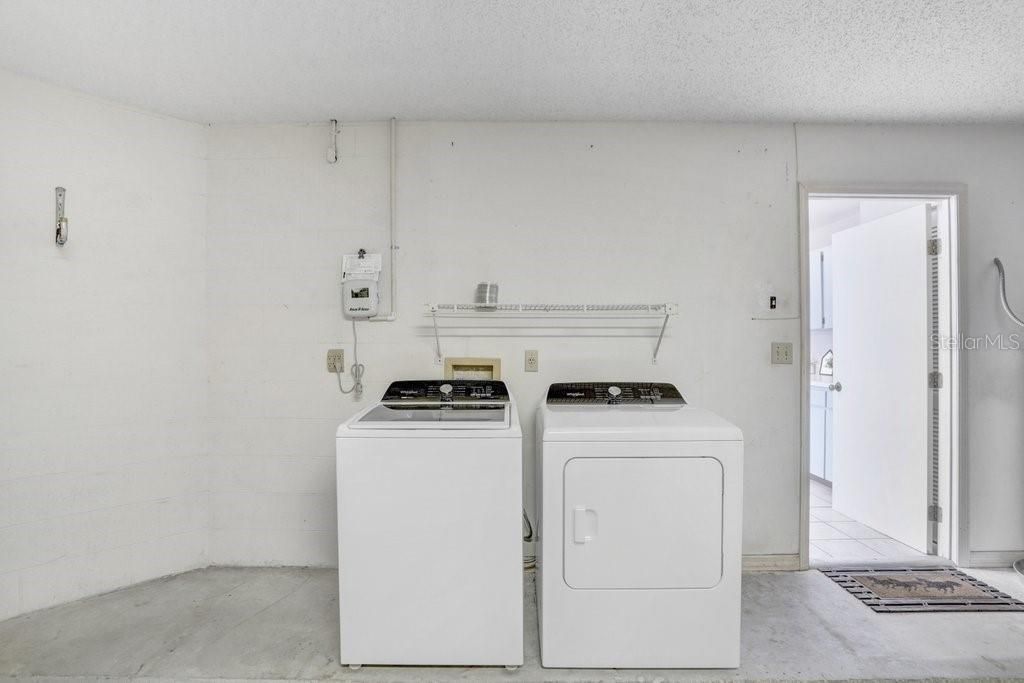 The washer and dryer are in the oversized garage, and they will stay with the home!