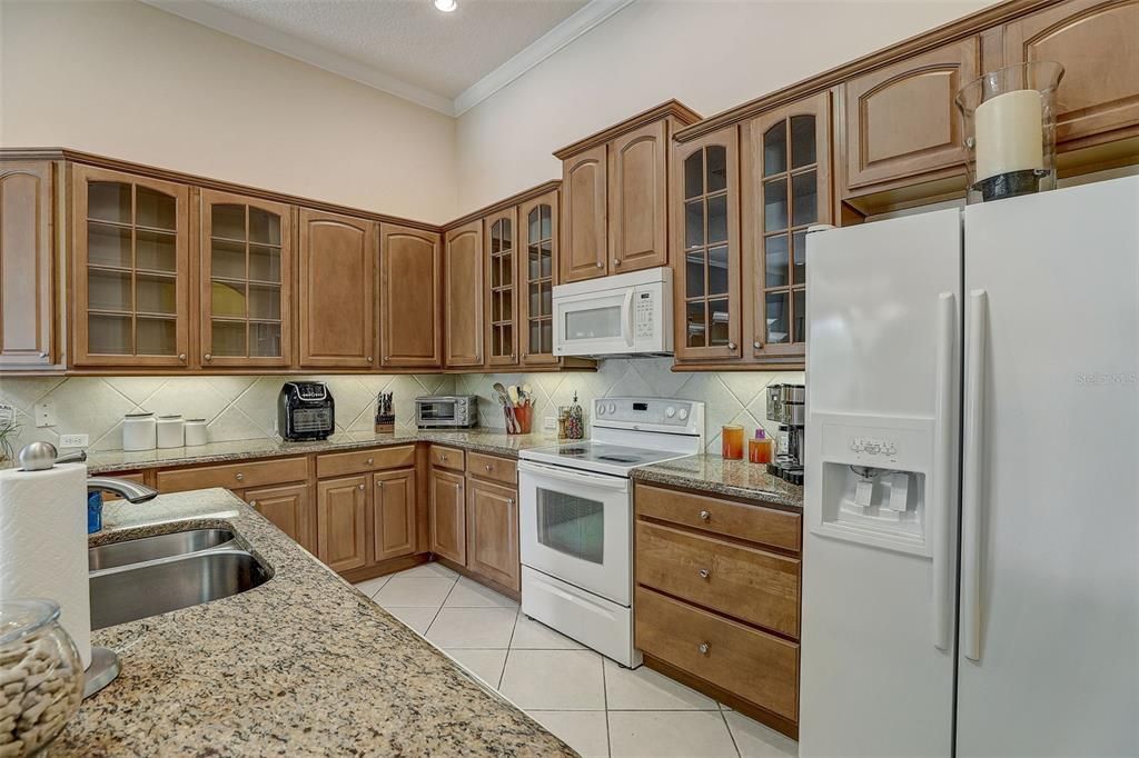 Spacious kitchen with granite countertops