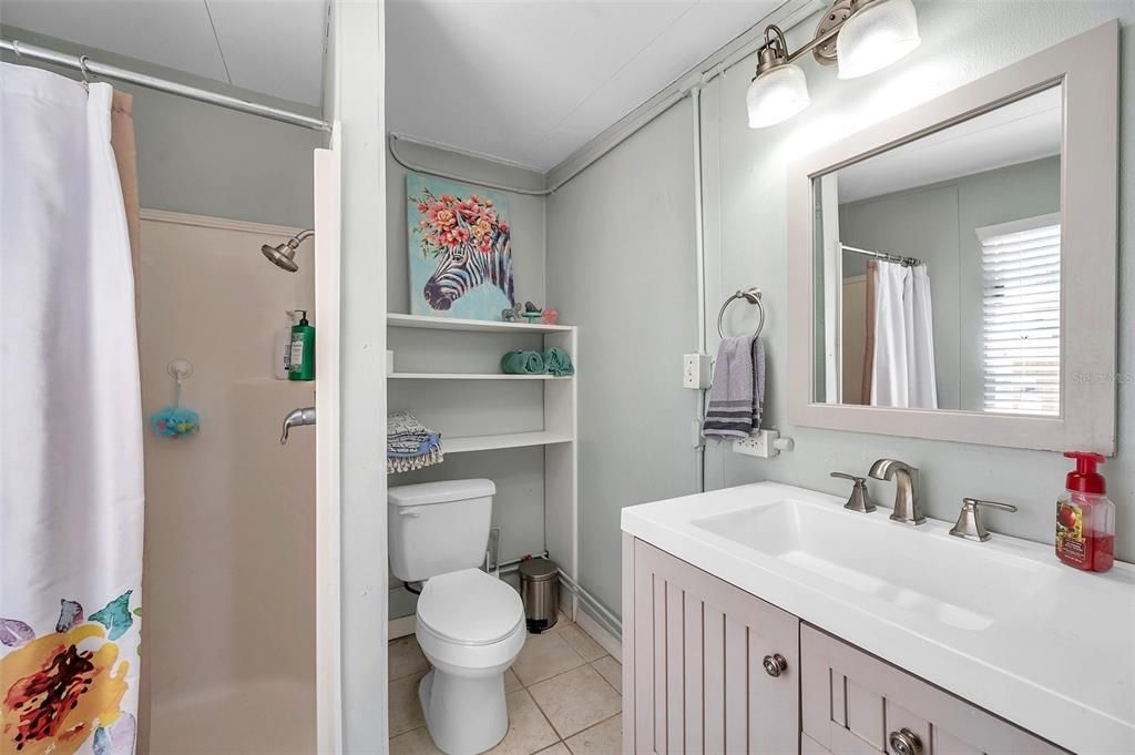 2nd bathroom has a walk in shower and is easily accessible from the pool and back yard.
