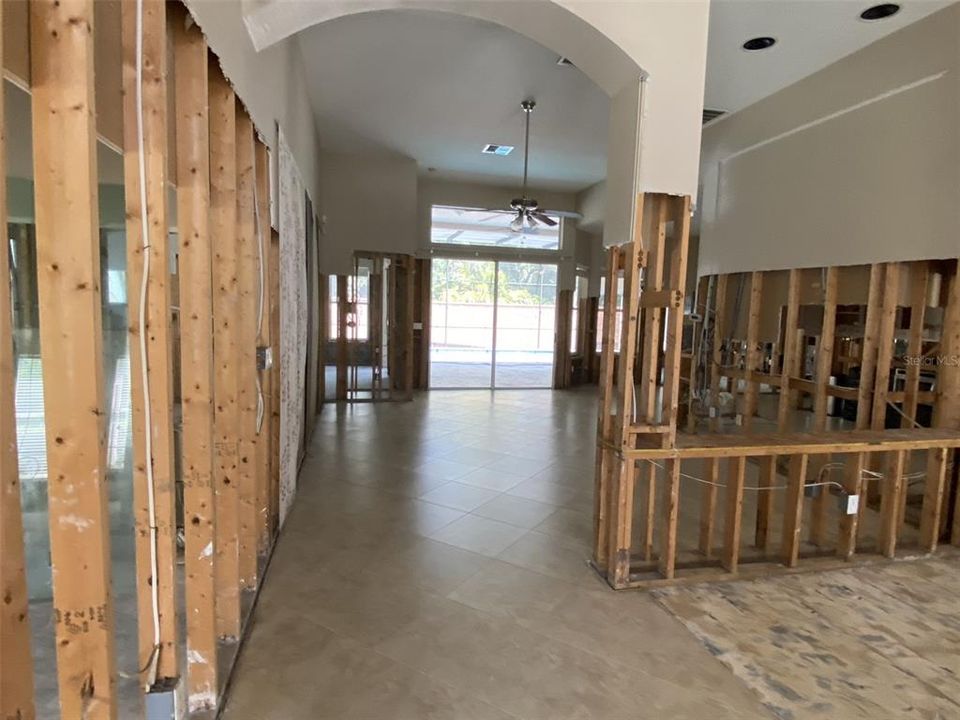 Foyer overlooking dining room and family room