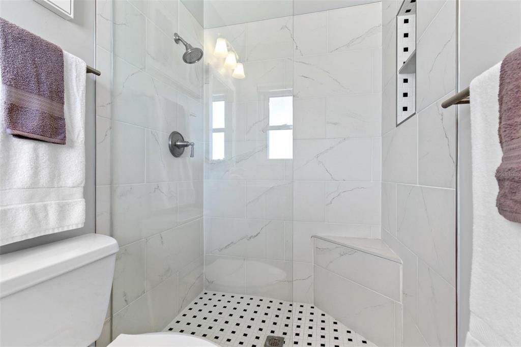 updated shower with glass enclosure in primary bathroom.  Your welcome!