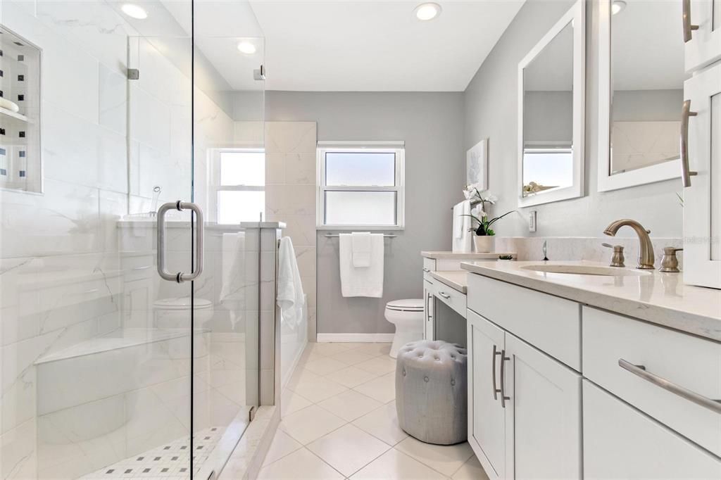Hall bath is a dream!  Fantastic  glass enclosed shower ADN a lovely soaking tub just past the shower.  How great are updated bathrooms??