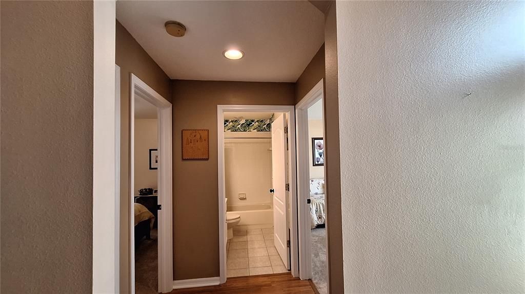 HALL LEADING TO 2 BEDROOMS AND BATH