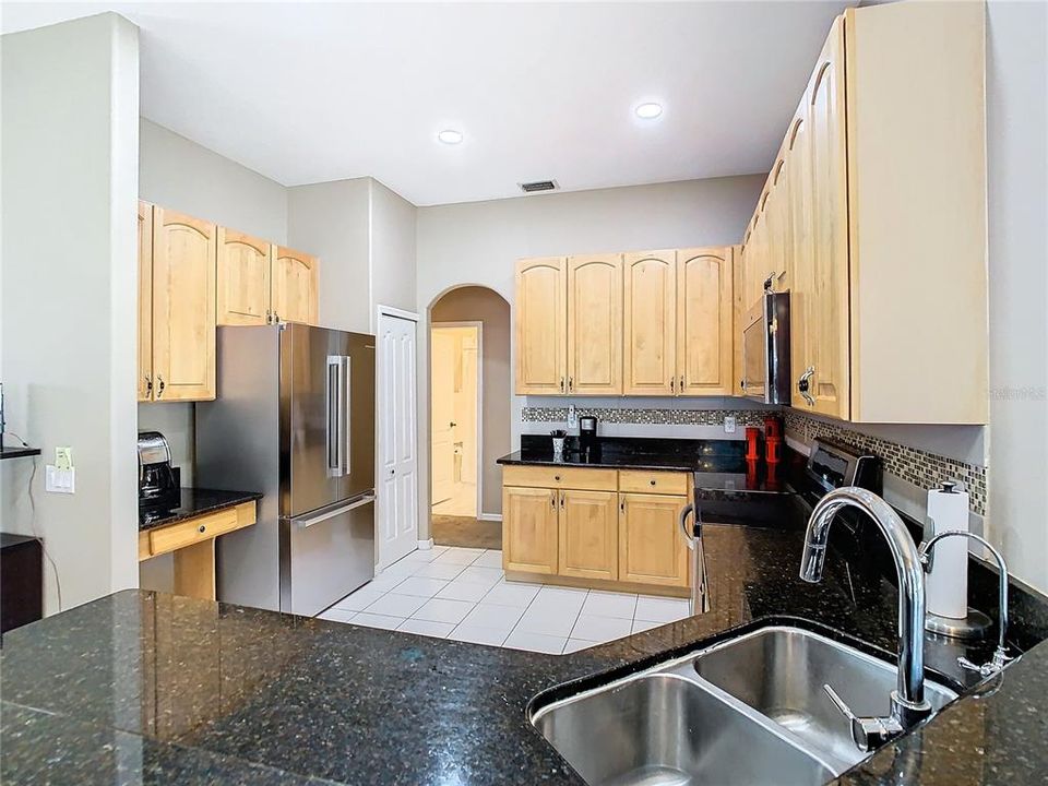 Kitchen with ample storage and counter space.