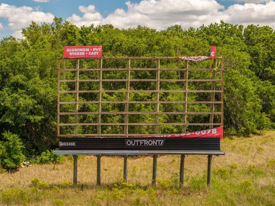 Billboard at far end of lot Paid Lease