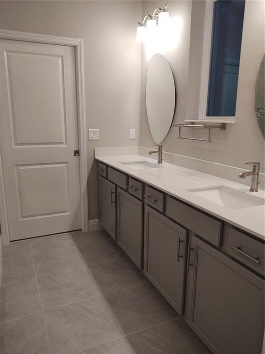 Grey Upgraded Cabinetry with Tons of Storage