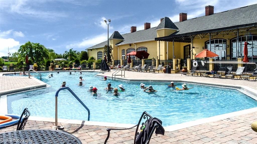 The heated outdoor pool and spa are located behind the main clubhouse.