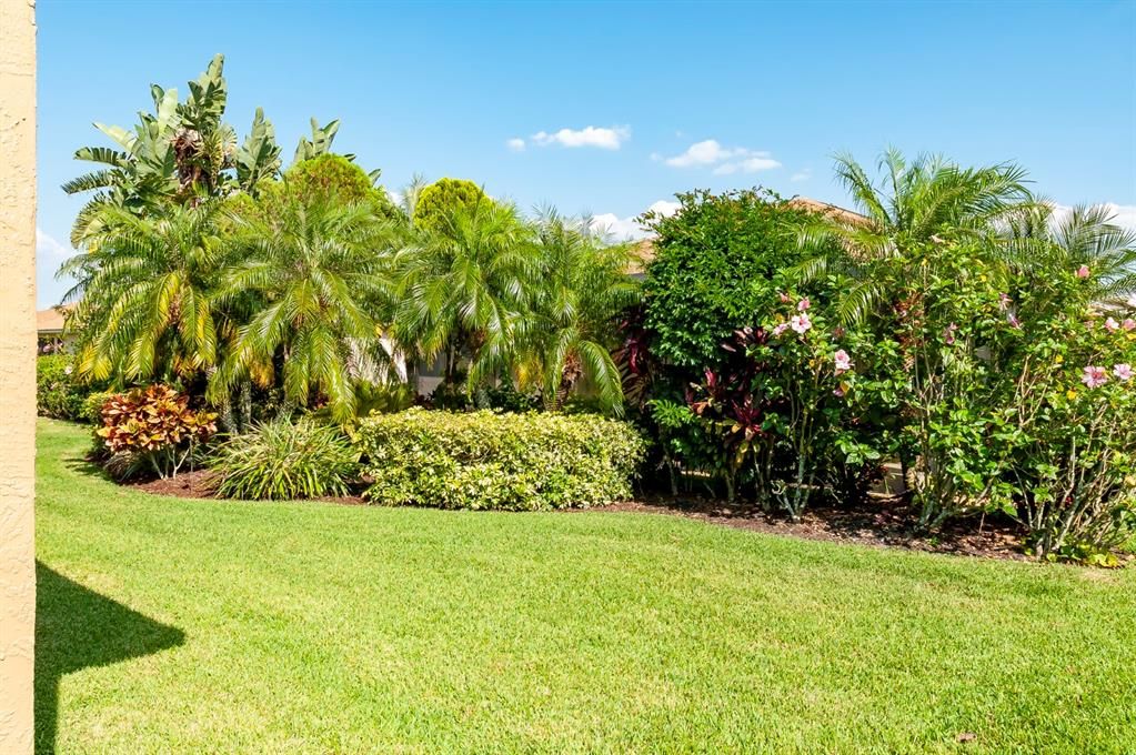 The landscape island and lot line plantings serve as a visual barrier to the neighboring homes.