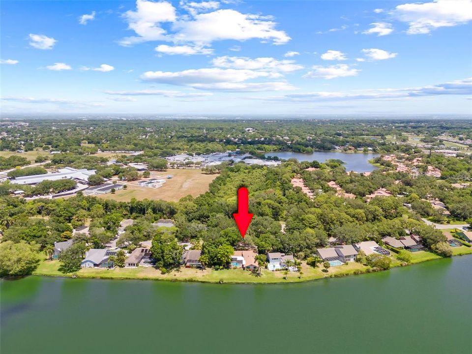 Privacy with mature landscaping on either side with beautiful views of the lake!