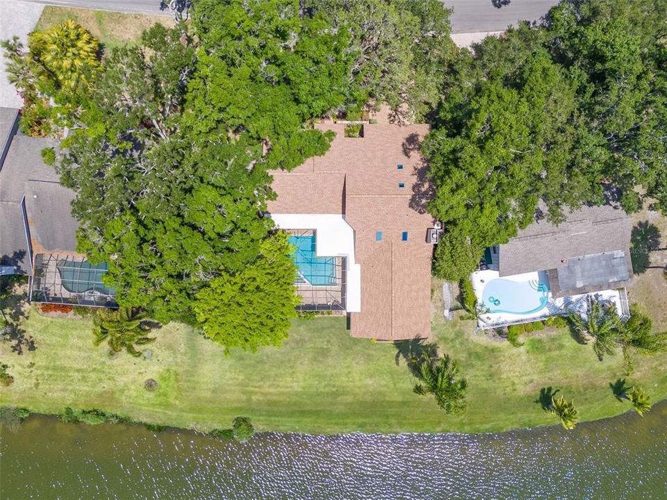Privacy with mature landscaping on either side with beautiful views of the lake!