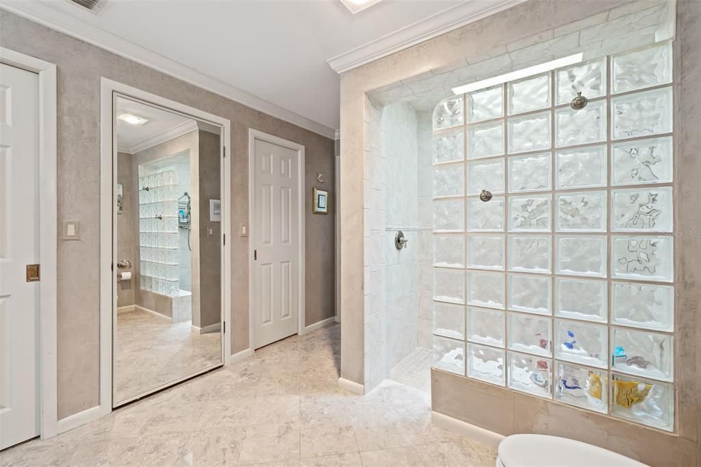 Walk In Closets and Walk in Shower with Glass Block
