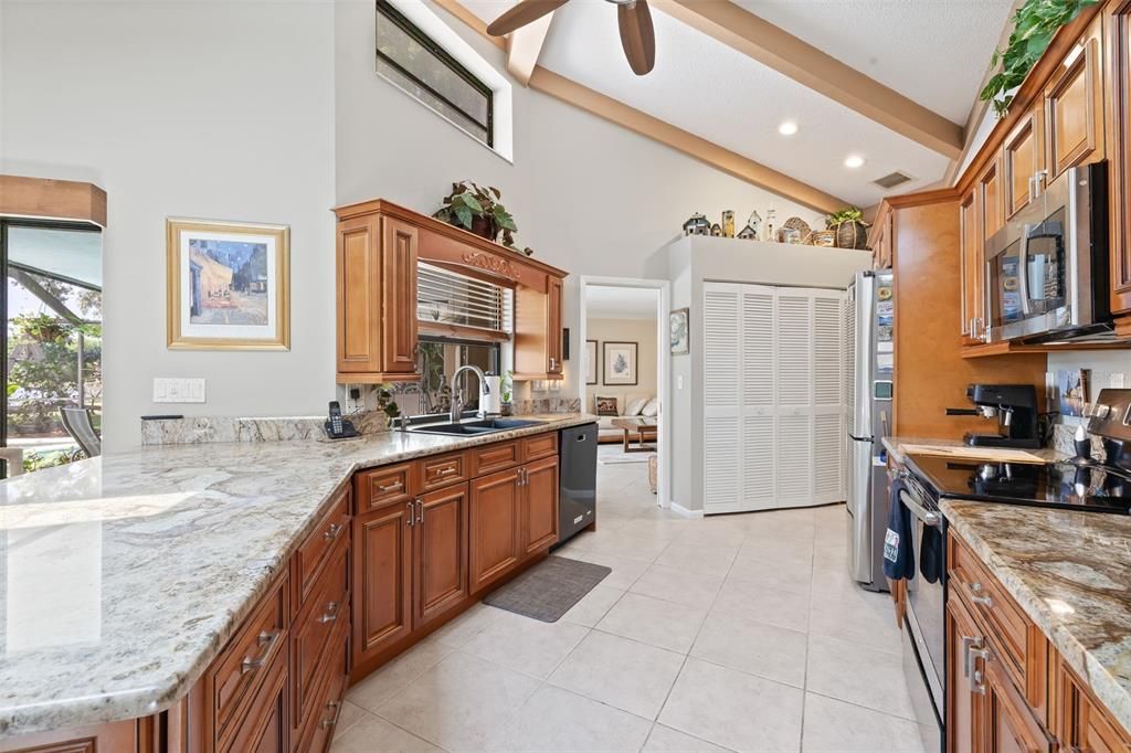 Beautiful Tuscan granite with wood cabinets!