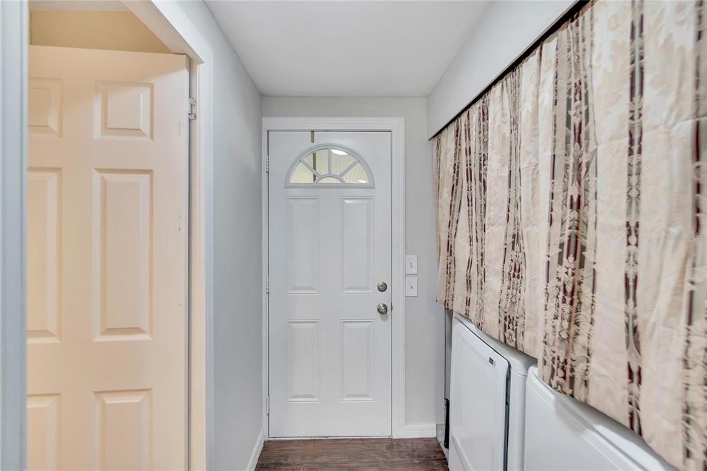Backdoor with laundry area to the right
