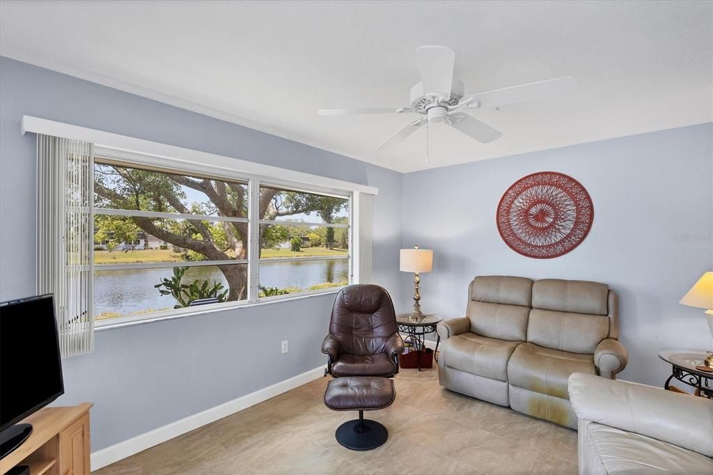 LAKE FRONT/LAKE VIEW Bonus room/TV room, could be a study/office or turned into a 3rd bedroom!