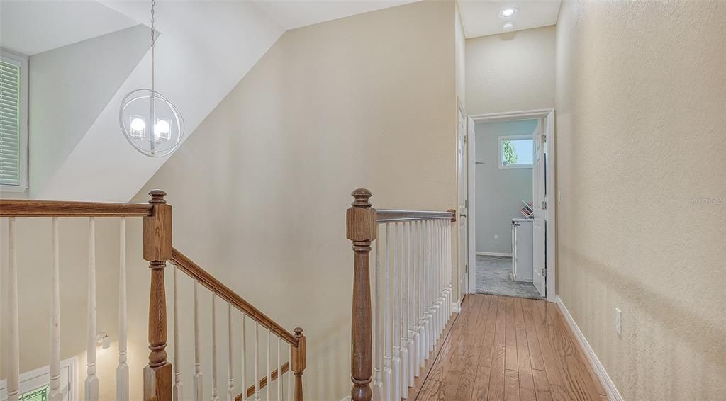 The beautiful stairs and landing feature gorgeous real oak floors.