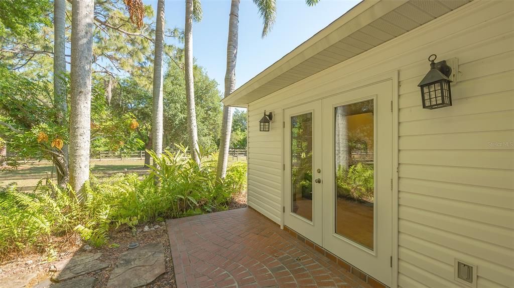 The Primary Suite has it's own very private front porch.