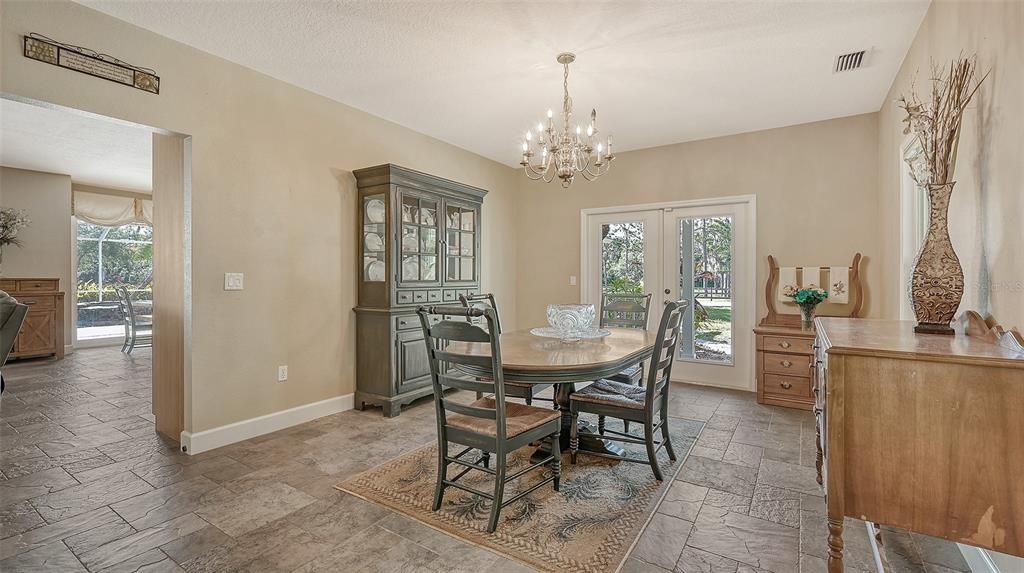 The formal dining room, in true Southern Style, has it's own room, next to the kitchen, but with a bit of separation.