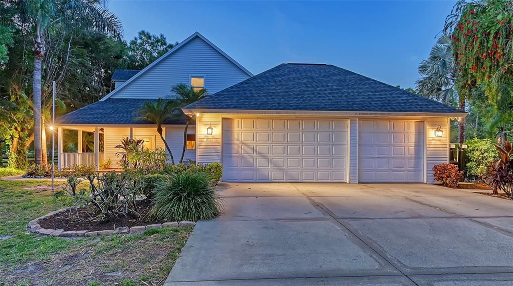 The home has so much parking, a long concrete driveway leads to the 3 car garage and there is an extra concrete parking area for your guests.