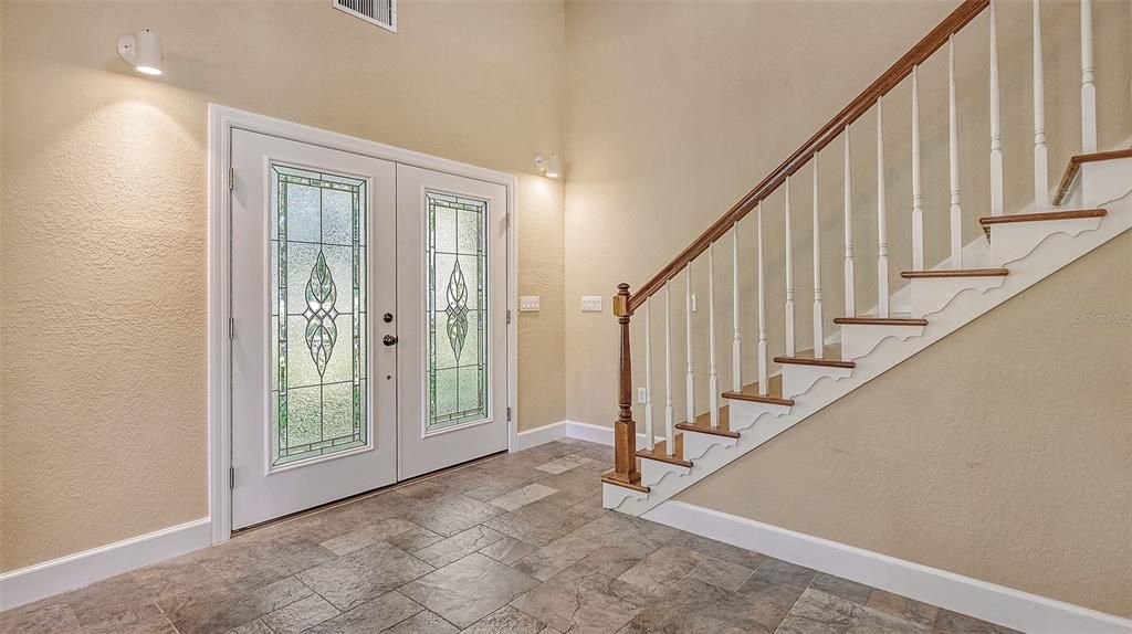 The 1st floor features a combination of porcelain floors and true hardwood floors.